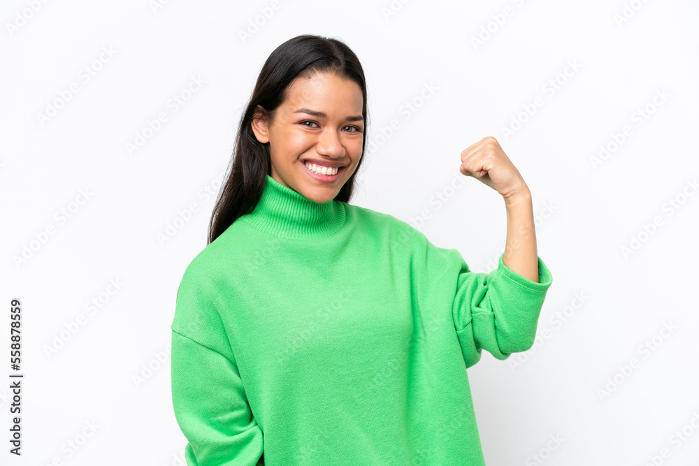 Young Colombian woman isolated on white background celebrating a victory Young Colombian woman isolated on white background celebrating a victory