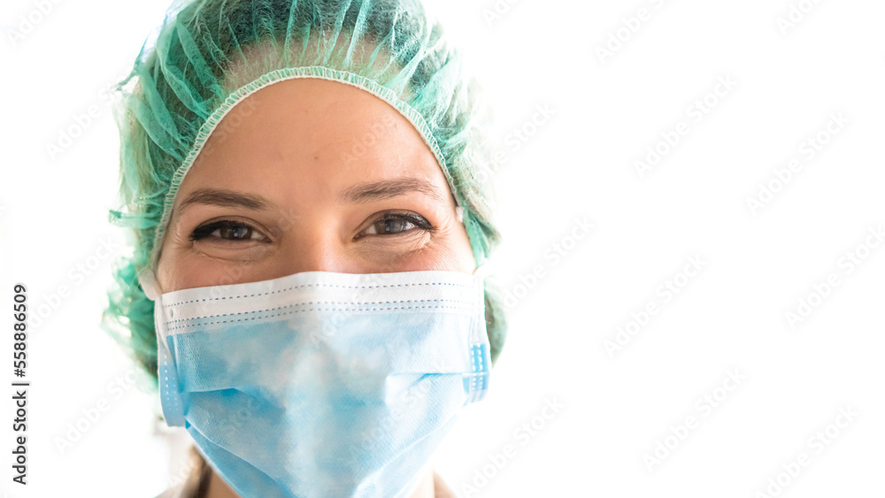 Young medical professional smile with procedure mask on her face Young medical professional smile with procedure mask on her face