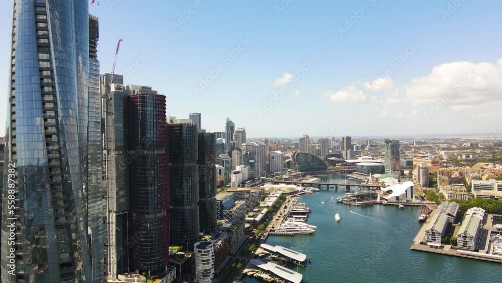 Aerial drone view of Barangaroo waterfront precinct in Sydney City, NSW looking toward Darling Harbour on a sunny morning    