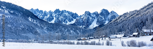 beautiful panoramic snowy winter landscape with Dachstein mountins in Gosau photo