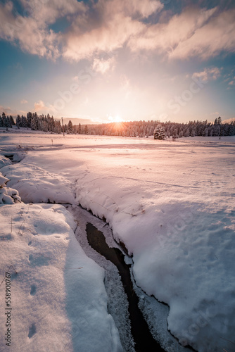 Snowy landscape long exposure photo view romantic sunset at winter