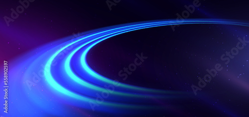 Abstract technology futuristic neon curved glowing blue light lines with speed motion blur effect on dark blue background.
