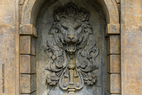 Ancient fountains with sculptures in the architecture of the city. Historical and cultural heritage Background