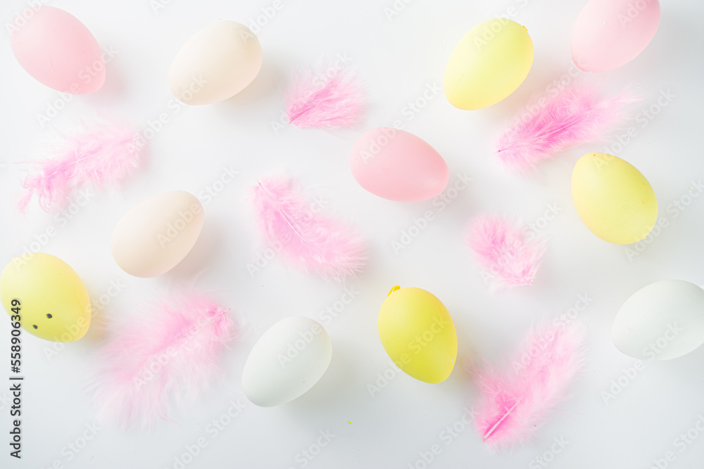 Flatlay of Easter eggs and feathers