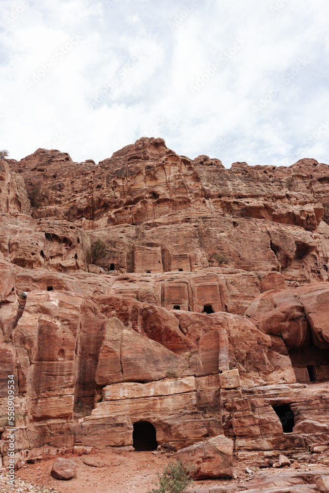 Stone tombs carved into the mountain in the ancient city of Petra in Jordan