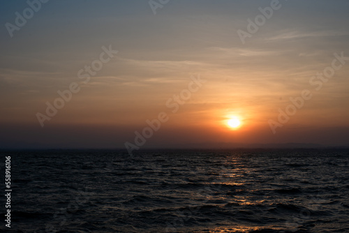 sunset over the sea © Tongsai Tongjan