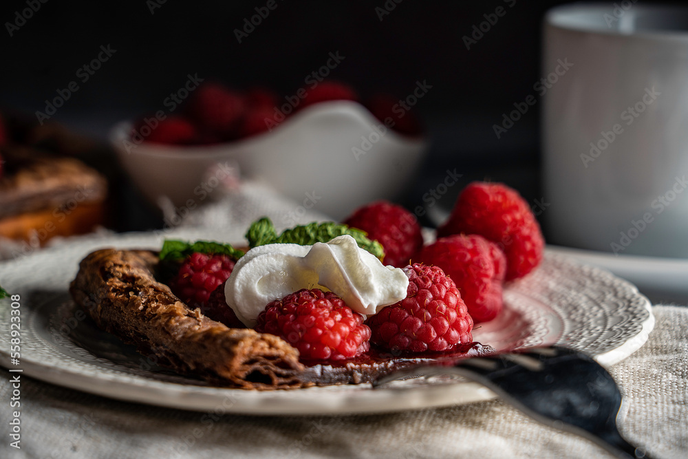 raspberry tart on chocolate puff pastry garnished with mint leaves
. raspberry tart on chocolate puff pastry garnished with mint leaves
.