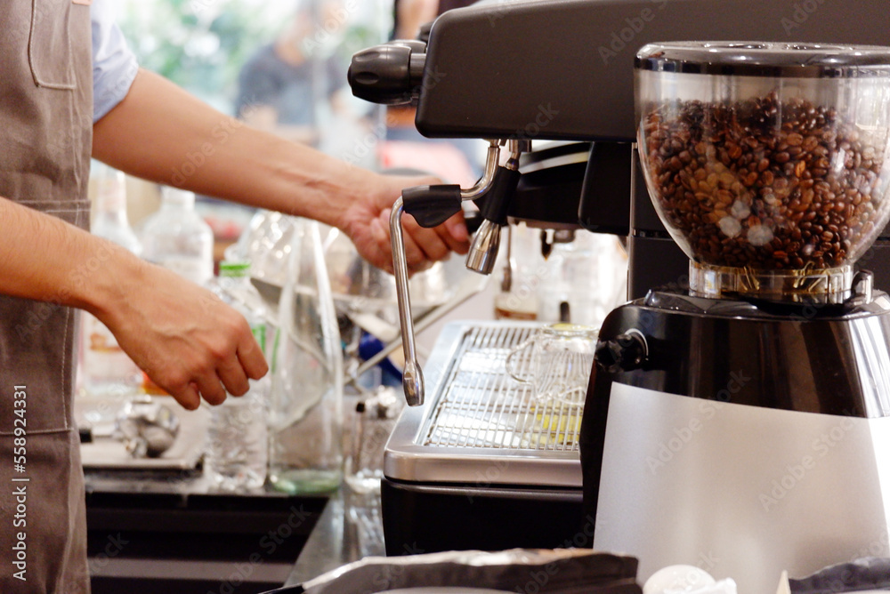 coffee shop staff using coffee machine coffee shop concept.