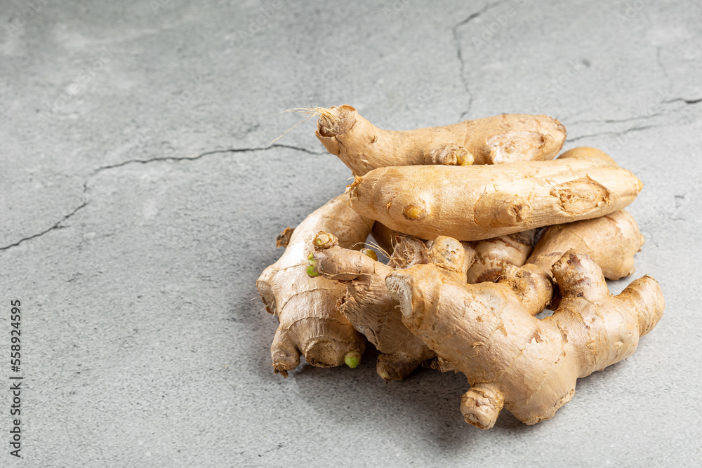 Organic fresh ginger root on the table. Organic fresh ginger root on the table.