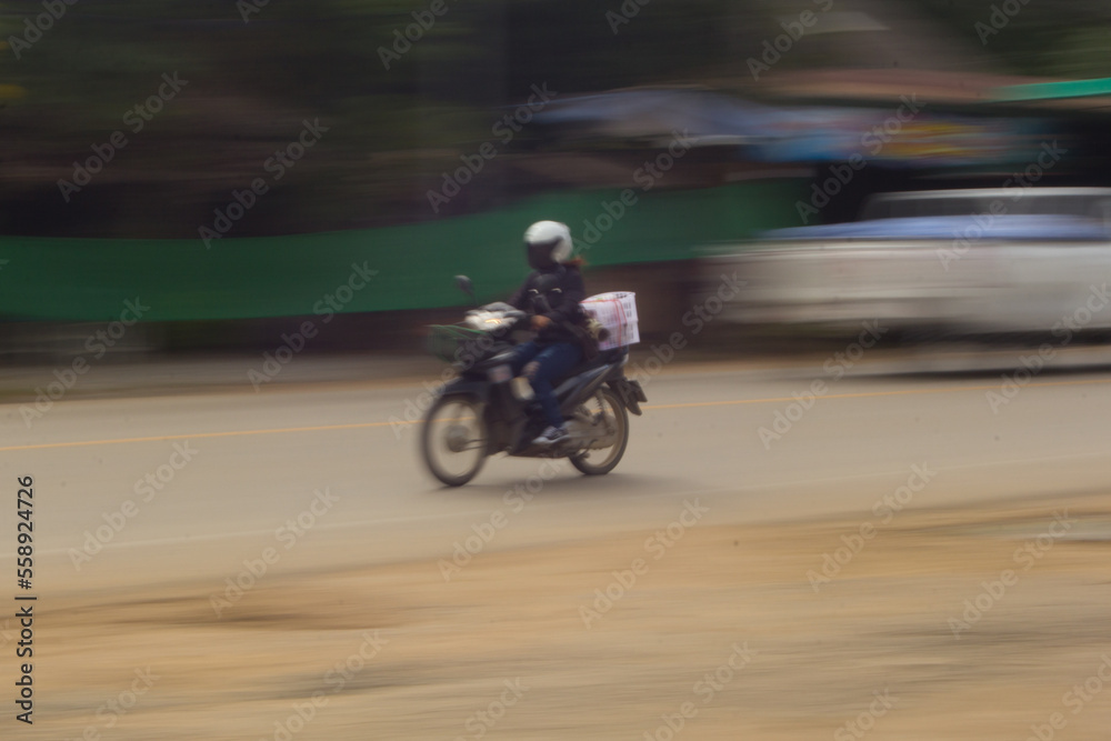 Motorcycling Panning on road In Thailand