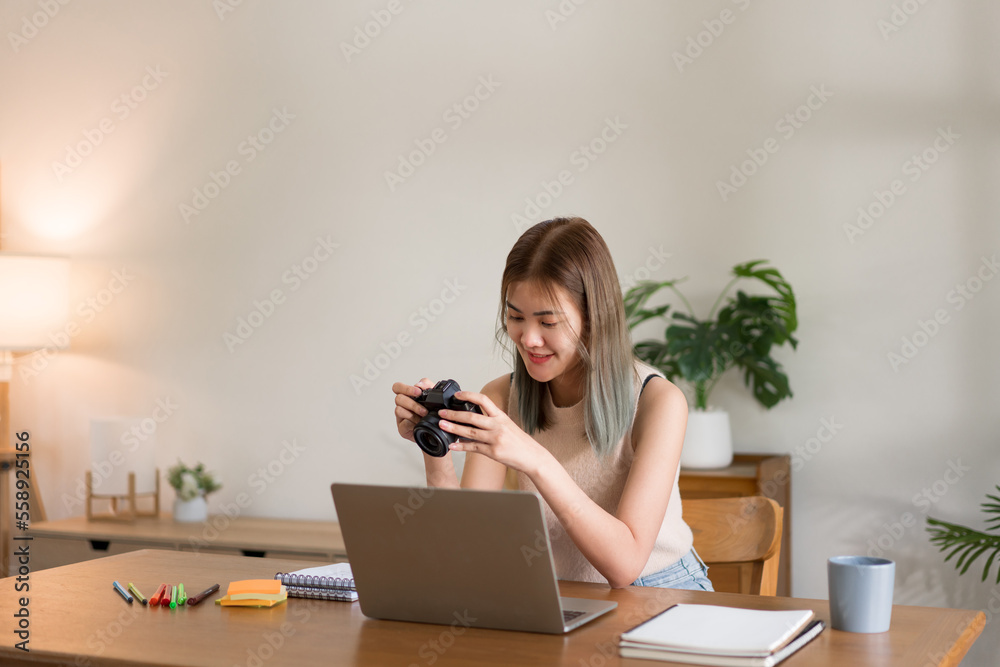 Creative design concept, Fashion designer checking picture in camera of new collection clothes Creative design concept, Fashion designer checking picture in camera of new collection clothes