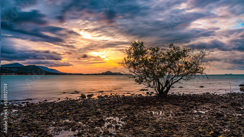 sunset on the beach in Koh Samui,Thailand ,Take pictures with a low speed shutter technique.