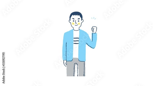 ガッツポーズをする若い男性