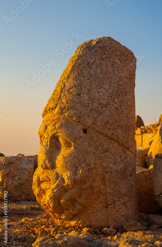 Tombs and monumental sculptures built by the Commagene King Antiochos I on the slopes of Mount Nemrut were included in the UNESCO World Heritage List in 1987.  These sculptures are used as museums. photo