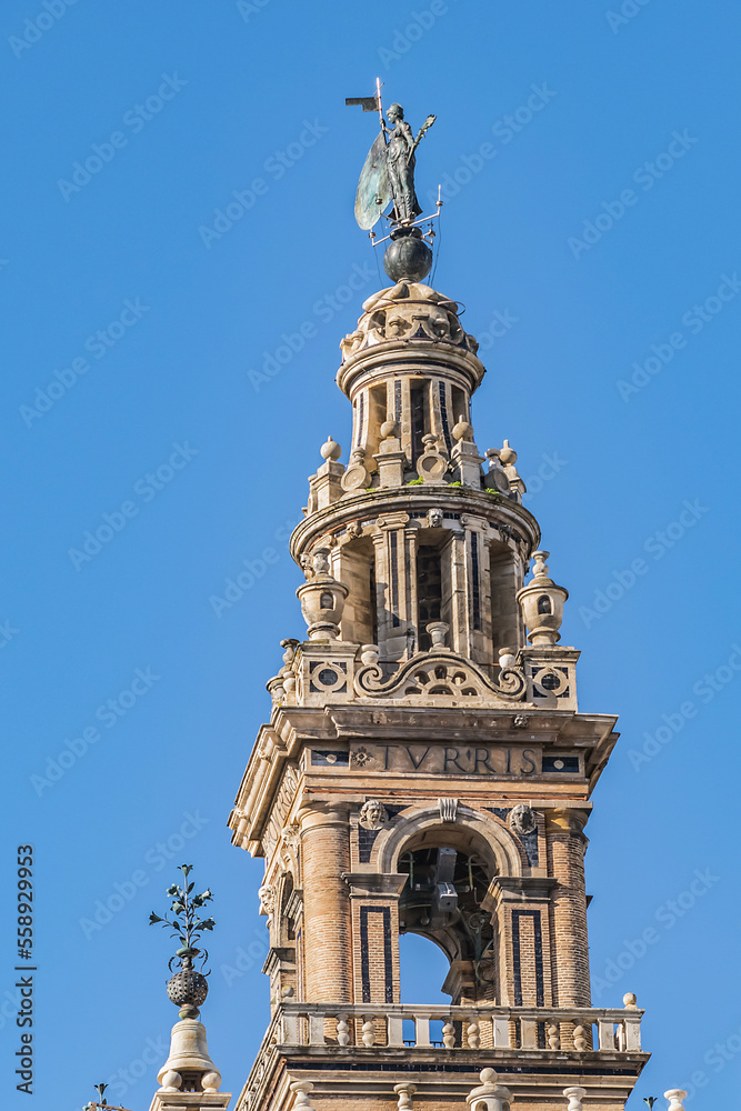 Roman Catholic Cathedral of Saint Mary of the See (Catedral de Santa Maria de la Sede, 1528). Giralda (La Giralda) - 104.1 m bell tower of Seville Cathedral. Seville, Andalusia, Spain.