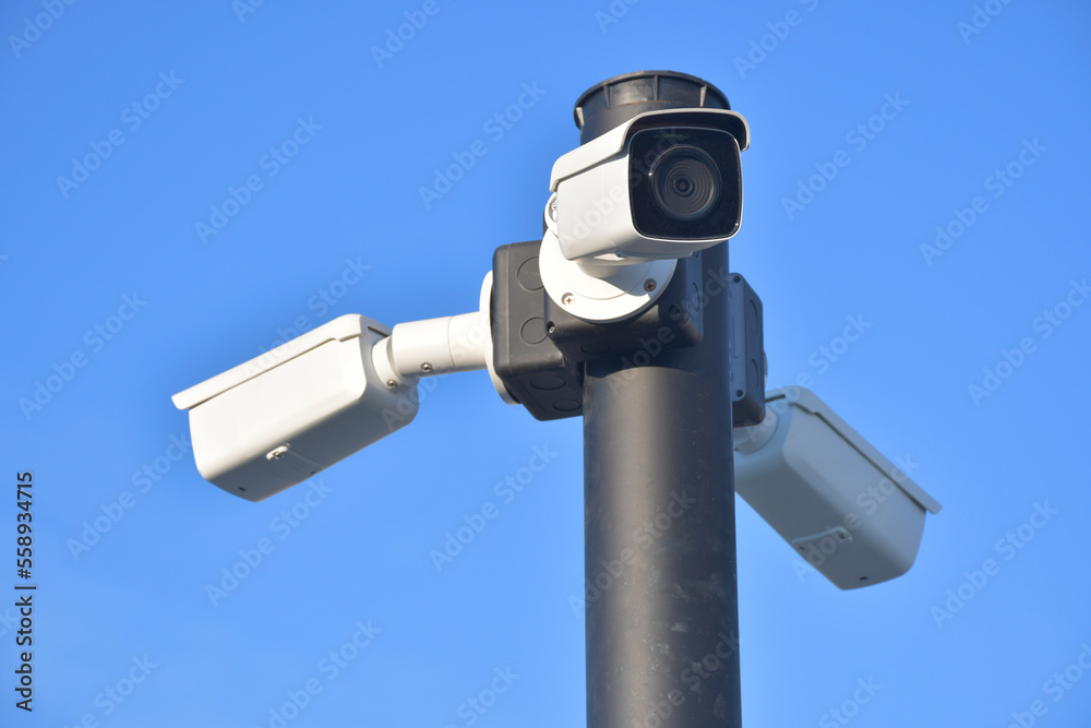 Several CCTV cameras are mounted on black steel poles. To record the incident and to allow the security officers to monitor the property and monitor the order through the CCTV camera.