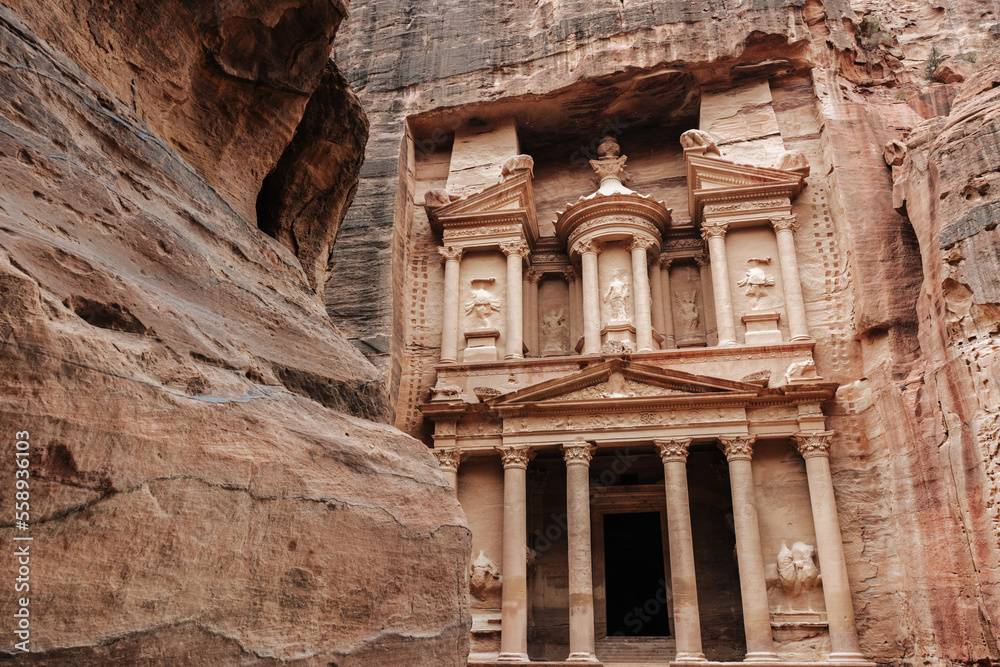 The Treasury tomb carved in stone, at the famous archaeological site Petra in Jordan.