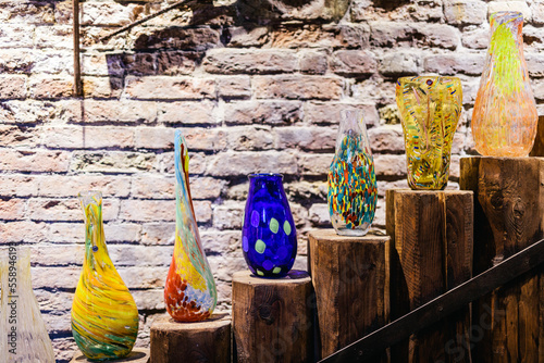 Murano glass exhibition of handmade glassware at workshop in Murano, Italy photo