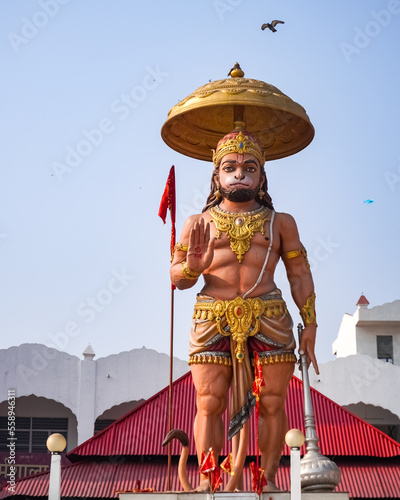Hindu Lord Hanuman Statue in Standing Heroic Posture photo
