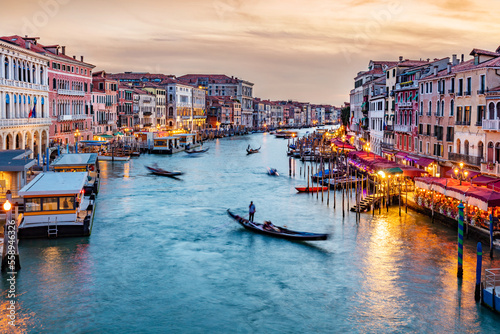 Grand Canal in Venice, Italy at sunset with gondolas