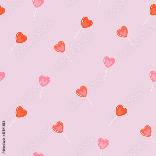 Seamless pattern with red and pink lollipop hearts. Vector graphics.