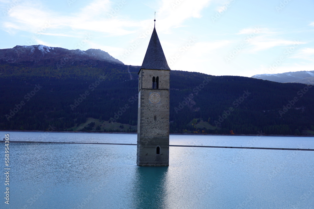 The Lake Reschen is an artificial lake in the western portion of South Tyrol, Italy