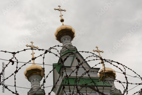 Church cross and behind bars and religion photo photo