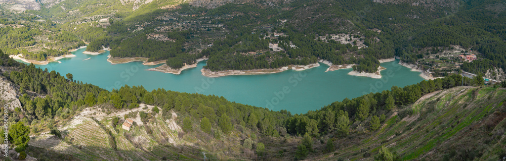 Panoramic view of the Guadalest reservoir from above in the town's viewpoint. Autonomous community of Valencia, Alicante, Spain. Panoramic view of the Guadalest reservoir from above in the town's viewpoint. Autonomous community of Valencia, Alicante, Spain.