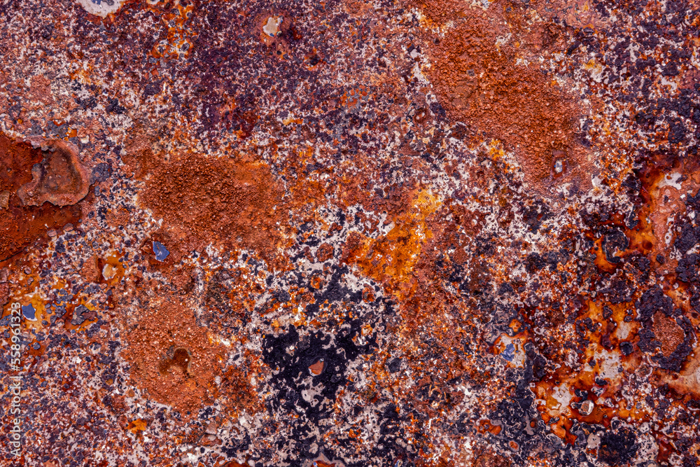 Abstract macro view of the paint and rust on the body of a car Abstract macro view of the paint and rust on the body of a car