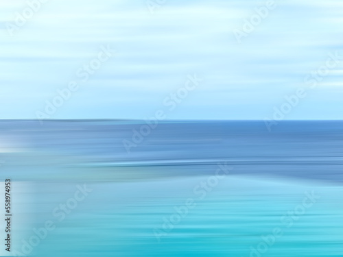 The sky and the ocean with the beach in the Maldives blurry motion photo. Blue background