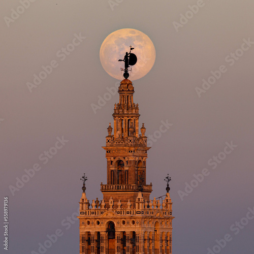 Big moon behind the Giralda photo