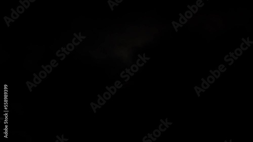 Rising bright full moon and fast moving clouds time-lapse