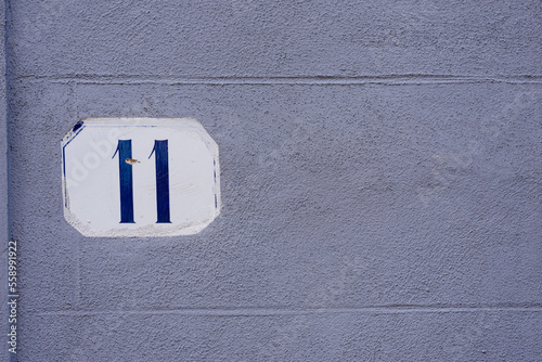 Number 11 on the blue wall