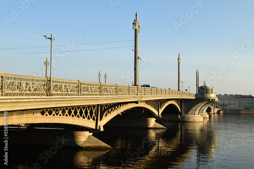 Annunciation Bridge, first permanent bridge built across Neva River in summer early morning. Saint Petersburg, Russia