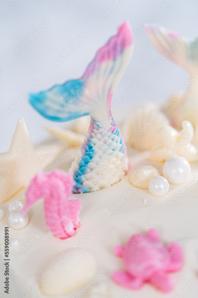 Fototapeta premium Mermaid themed 3 layer vanilla cake