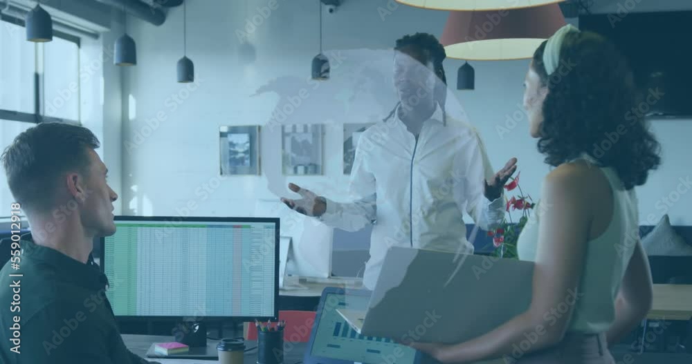 Animation of spinning globe icon over three colleagues discussing together at office
