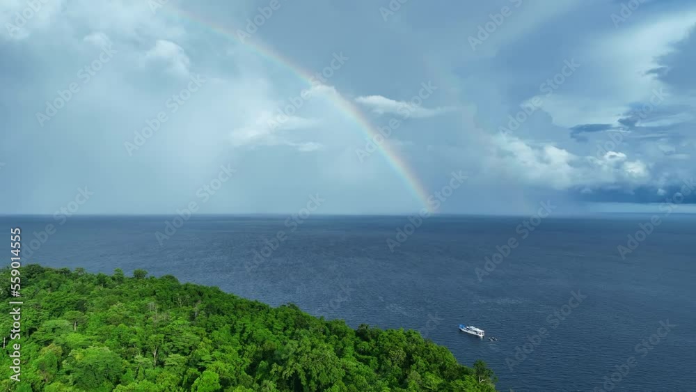 A beautiful rainbow appears near a lush, tropical island in the Solomon Islands. This South Pacific country is known for its spectacular marine biodiversity and its many historic World War II sites. A beautiful rainbow appears near a lush, tropical island in the Solomon Islands. This South Pacific country is known for its spectacular marine biodiversity and its many historic World War II sites.