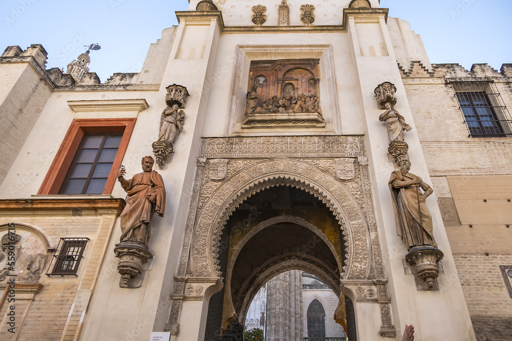 Roman Catholic Cathedral of Saint Mary of the See (Catedral de Santa Maria de la Sede, 1528). North facade. Door of Forgiveness (Puerta del Perdon). Seville, Andalusia, Spain.
