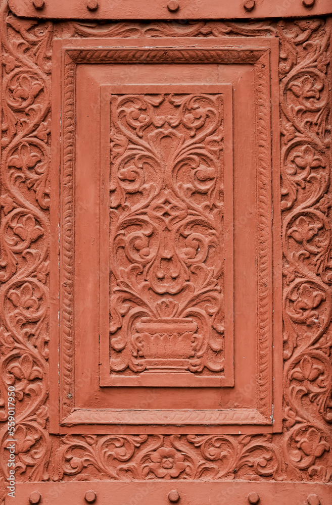 The intricate design carved on red stone at Junagarh fort , Bikaner, India