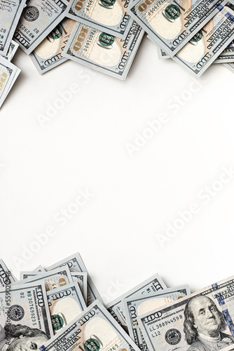 Stack of US paper currency. Dollars closeup concept. American Dollars cash money. One hundred dollar banknotes. Top view. Space for text. Negative space. Banknotes top and bottom