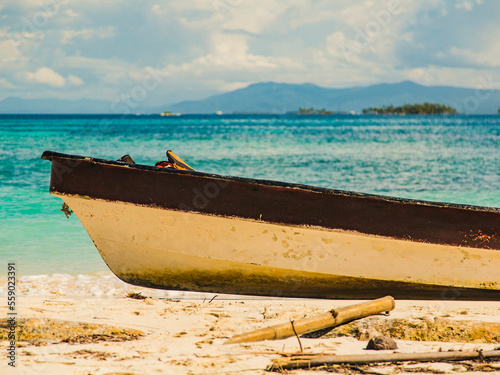 Wooden boat on land in San Blas islands. photo