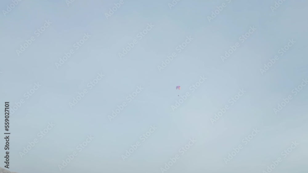 Paraglider in the sky, aerial view. Paraglider in the sky, aerial view.