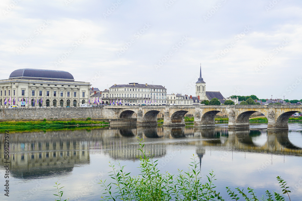 Beautiful Cessart bridge of Saumur reflected on the Loire River, Loire valley,France 