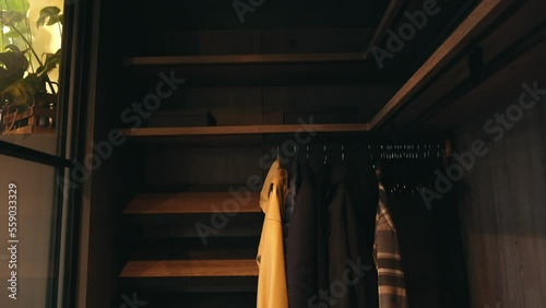 panorama over a small dark wardrobe