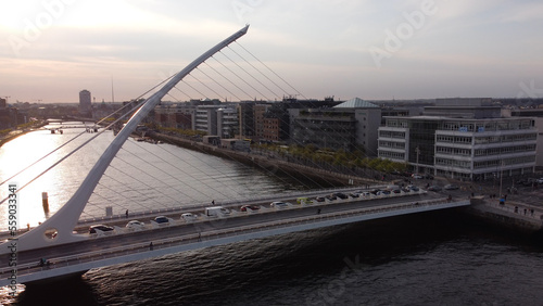 Samuel Beckett Bridge over River Liffey in Dublin - aerial view by drone © 4kclips