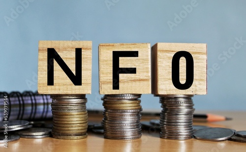 NFO concept, New fund offerings concept on wooden blocks.  photo