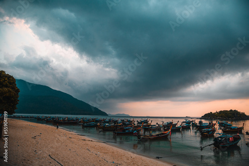 Sunrise beach with long tail boats in Koh Lipe, Satun, Thailand