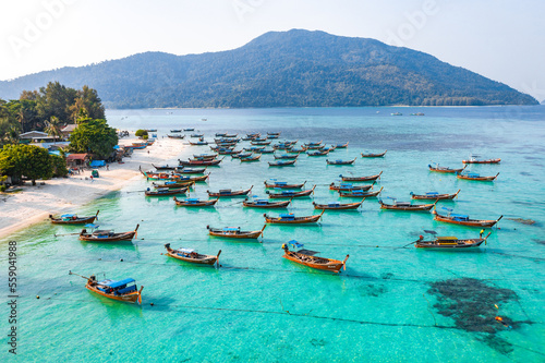 Aerial view of Sunrise beach with long tail boats in Koh Lipe, Satun, Thailand photo