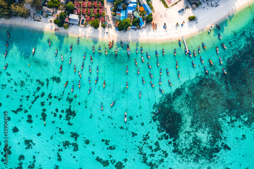 Aerial view of Sunrise beach with long tail boats in Koh Lipe, Satun, Thailand photo