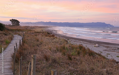 Walking Waihi Beach at sunset - New Zealand